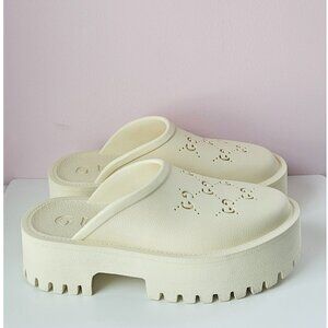 Gucci Platform Perforated G Slip On Sandals.